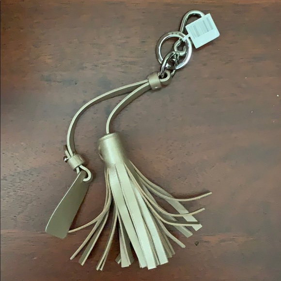 NWT Tumi Tassle Gold Metallic Leather - Picture 1 of 3